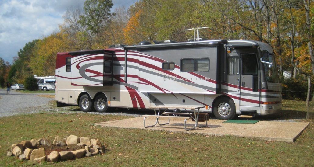 RV Parked At An Up The Creek Site By A Firepit RV Parked At An Up The Creek Site By A Firepit
